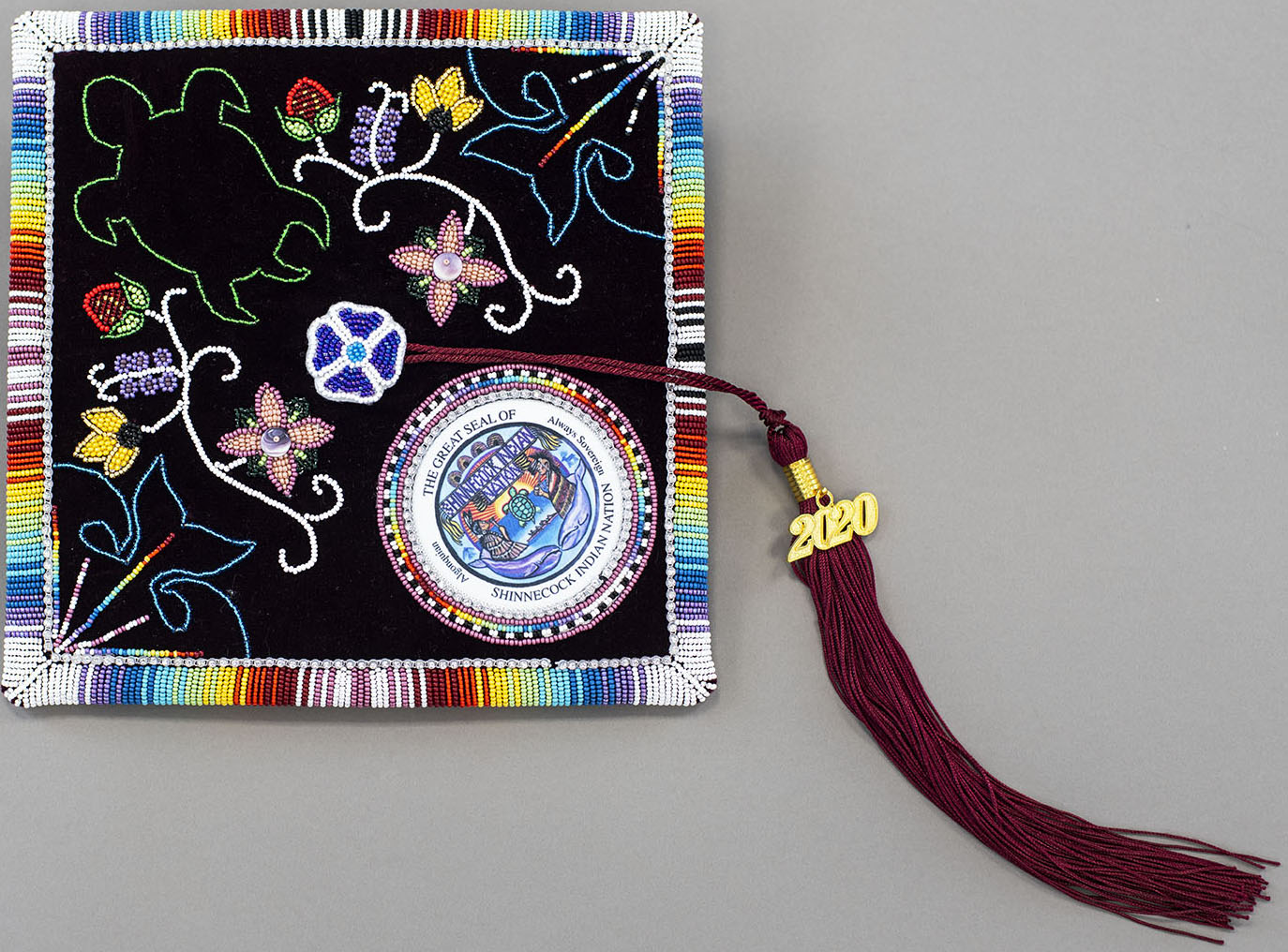 Graduation Cap from 2020 with beaded decoration with the Great Seal of the Shinnecock Indian Nation
